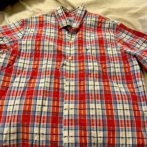 Short sleeve Medium Izod button up shirt.